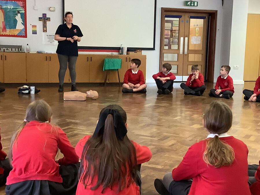 Trainer in front of children